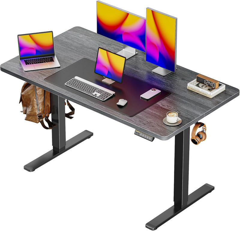 Huuger 55 x 28 Large Electric Standing Desk, Height Adjustable Computer Desk, 27.6" Deep Desktop, Stand up Gaming Office Table with 2 Hooks, 3 Preset Heights, for Home Office, Black